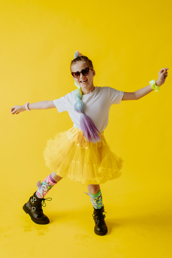 a standing girl in Rainbow Sherbet Straight Ponytail 