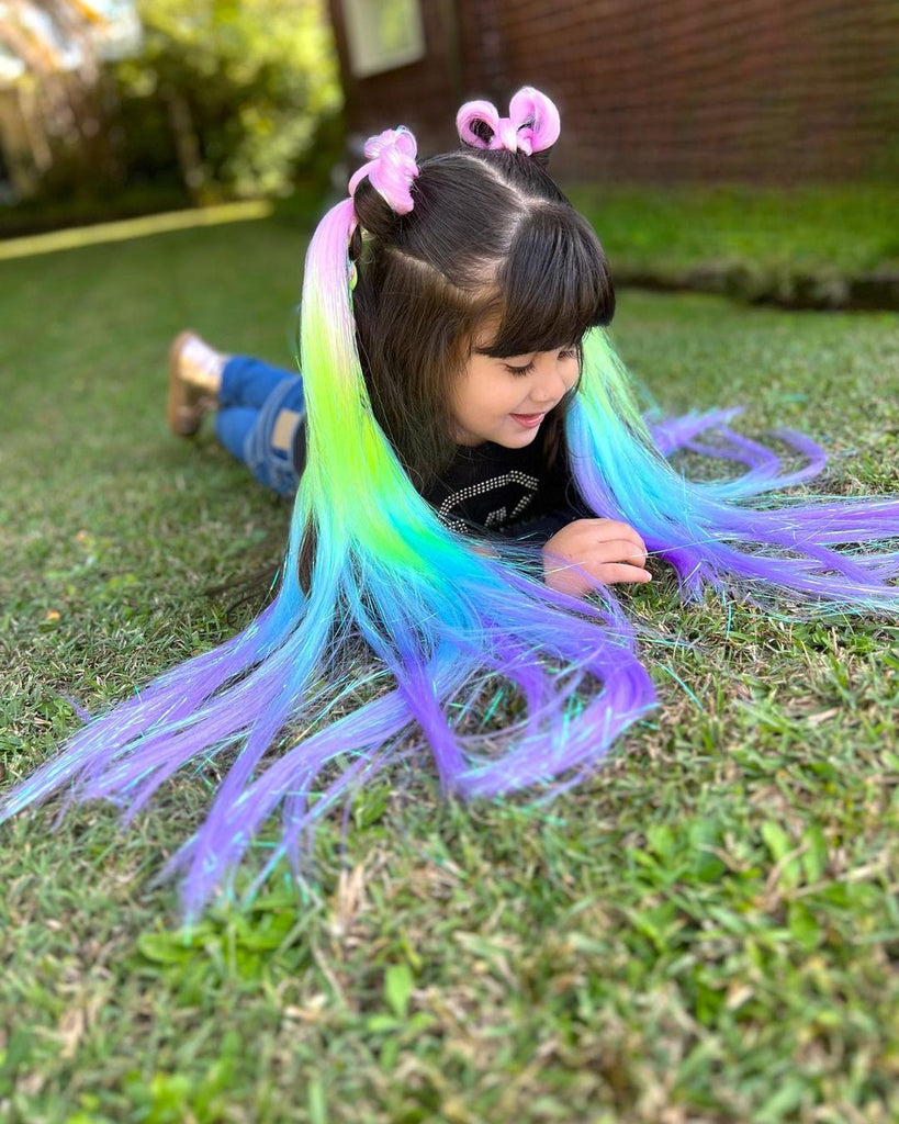 girl is lying on the grass while her hairs are tied in Rainbow Sherbet Straight Set 