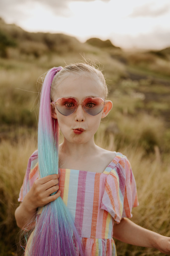 little girl in Bubblegum Straight Tinsel Ponytail