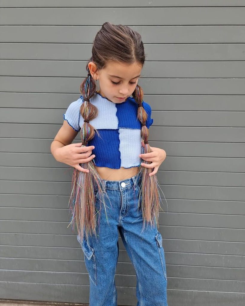 little girl is standing by wearing Chocolate Milkshake Straight Ponytail 
