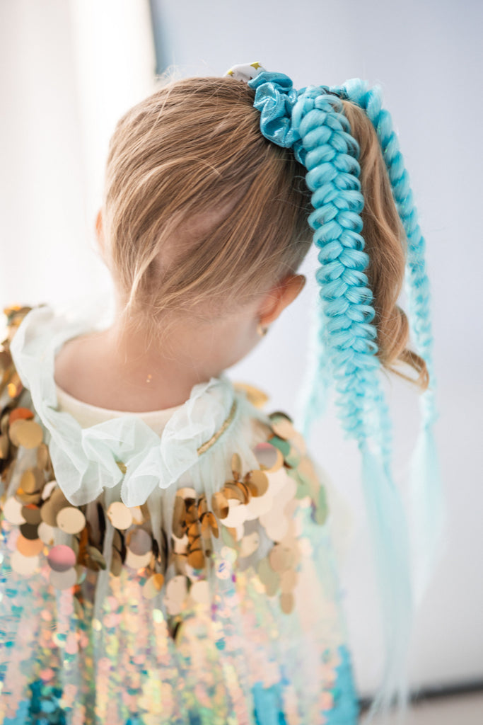 little girl in Blue Sequin Cape